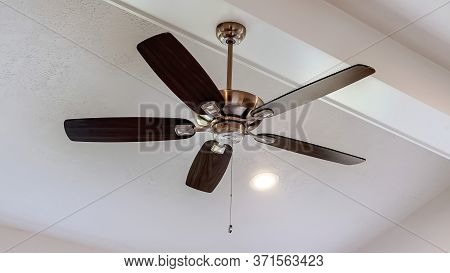Panorama Decorative Wood Beam With Standard Ceiling Fan And Lights Inside A House