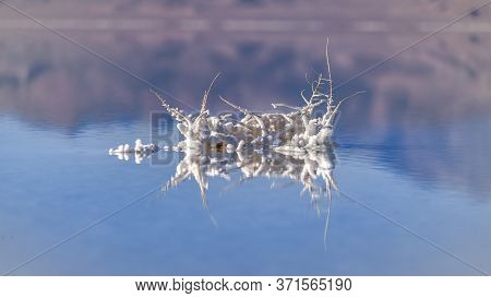 Panorama Crop Crystallised Salt Formation Reflected In The Lake
