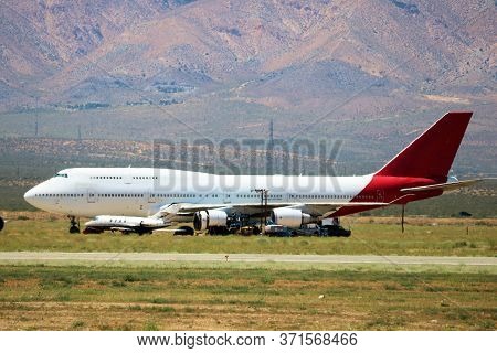 June 10, 2020 In Mojave, Ca:  Retired Commercial 747 Aircraft Stored On The Airfield To Be Resold Ta