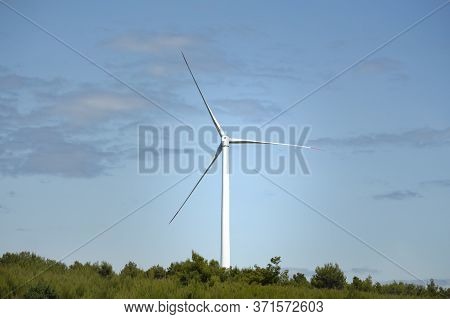 Windmill Farm For Electric Power Production In The Mountains Of Croatia, In A Beautiful Bright Day