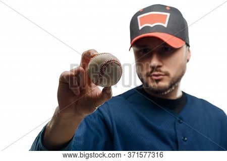 Knuckleball In Pitchers Hands On White, Selective Focus