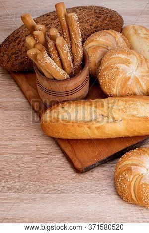 Сrisp Bread With Buns. French Baguettes. Fresh Crispbread. Bread Background. Different Breed  On Woo