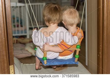 Happy Cute Children Brother And Sister Sit On A Bed With Pillows And Laugh, Happy Childhood