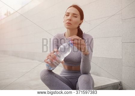 Woman Fitness In Beautiful Style With Water