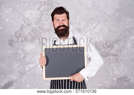Brutal Man Hipster Hold Blackboard, Copy Space. Coffee To Go. Nicest Price In Town. Bearded Chef Sho