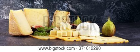 Different Sorts Of Cheese. Cheese Platter With Different Cheese And Spice