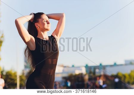 Tired Runner Sweating After Running Hard In Countryside Road. Exhausted Sweaty Woman After Marathon 