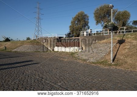 Old Lock Gate Of Doel In Belgium Reinforced With Sandbags Against Flooding