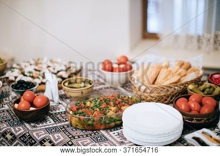 Buffet With Different Gourmet Traditional Appetizers For Wedding Party