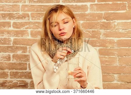 Take Medications To Reduce Fever. Woman Tousled Hair Scarf Hold Glass Water And Tablets Blister. Gir