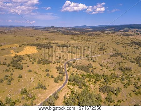 Sealed Winding Road Through Calcareous Limestone Karst Landscape Of Causse Noir In Cevennes France