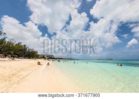 Nassau, Bahamas - May 3, 2019: People Relax On The Goodman's Bay Beach. Goodman's Bay Is A Public Be
