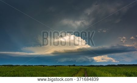 Supercell Storm Clouds With Wall Cloud And Intense Rain