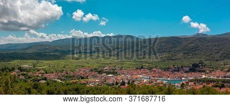 Picturesque Panorama Of Starigrad Town On The Island Of Hvar. Seen From A Nearby Hill. Old Church Be