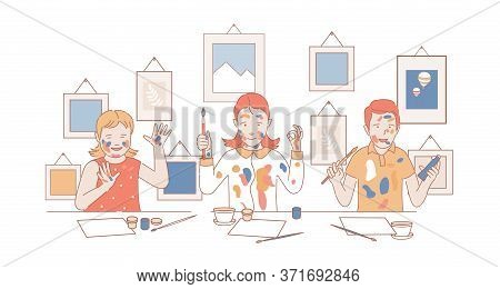 Happy Stained With Paint Children Drawing Pictures On Paper. Smiling Boy And Girls Holding Paintbrus