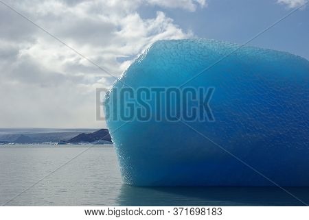 Blue Iceberg Glaciar In Lago Argentino Patagonia Sunny Day