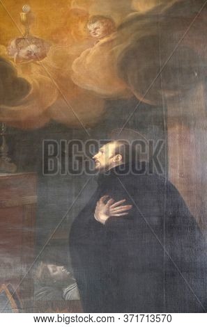 ZAGREB, CROATIA - SEPTEMBER 26, 2018: Saint Francis Borgia, altar in the Church of Saint Catherine of Alexandria in Zagreb, Croatia