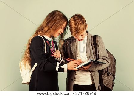 Use Your Imagination. Little Girl And Boy Do Painting In School. Drawing From Imagination. Childrens