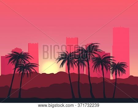 Seeing The Skyline Of Buildings Among The Palm Trees As The Sun Sets