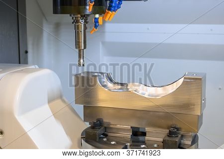 The 5 Axis Cnc Machining Center Cutting The Automotive Mold Parts With Solid Ball Endmill Tools. The