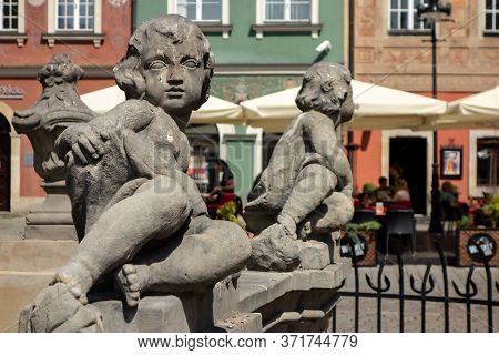 Poznan, Poland - August 11, 2018: The Boy Statues At Fontanna Prozerpiny W Poznaniu, The Fountain At