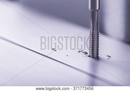 Thread Tap. Steel Tap Drill Aluminum Alloy Profile. Working Cutter.
