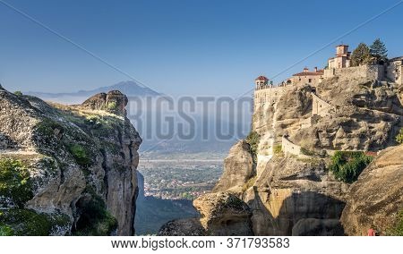 The Meteora Monasteries Of The Holy Trinity On Cliff In Kalambaka, Greece A Unesco World Of Heritage