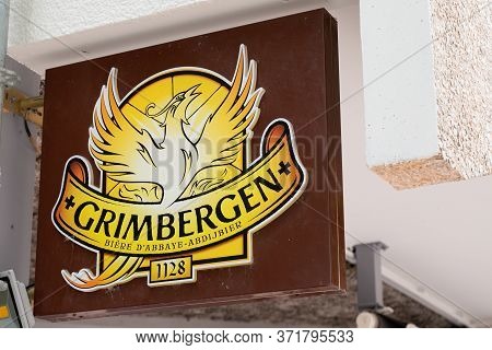 Bordeaux , Aquitaine / France - 05 12 2020 : Grimbergen Belgian Abbey Beers Sign Green Logo Bar Bran