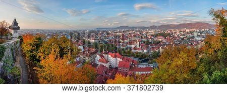 Cityscape Of Graz And The Clock Tower (grazer Uhrturm), Famous Tourist Attraction On Shlossberg Hill