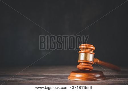 Old Judge Hammer With Law Book On The White Background, Used For Adjudication And Justice.