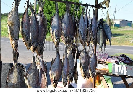 Showcase With Dried River Fish At The Local Market.