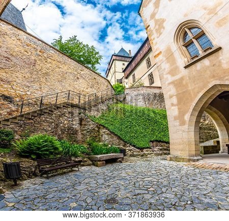 Famous Medieval Gothic Castle Karlstejn On Top Of The Hill. Beautiful Stronghold Is Built By King Ch