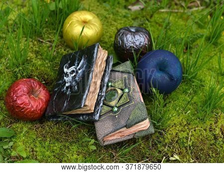 Fairy Tale Book With Magic Poisonous Apples In The Garden. Esoteric, Gothic And Occult Background Wi