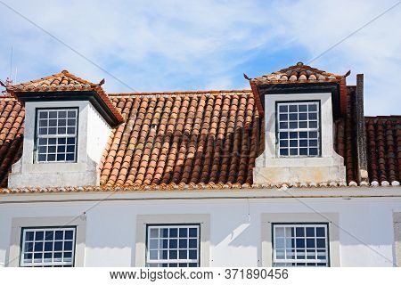 Traditional Portuguese Building With Dormer Windows In The Praca Do Marques De Pombal (marquis Of Po