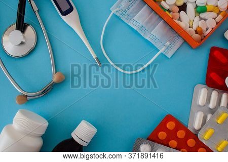 Colorful Tablets And Capsules In Box, Statoscope, Medical Mask, Antiseptic Bottle, Container, Tablet