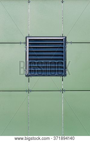 Texture Of The Wall Of A Modern Building With A Ventilated Facade. Green Ceramic Composite Facade Pa