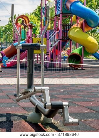 Eliptic Bicycle Or Cross Trainer Fitness Equipment In Public Park In Bucharest, Romania.