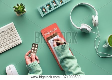 Drug Costs Calculation. Keyboard, Calculator, Pills And Pill Case On Green Mint Background. Checking