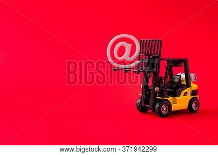Close-up View Of Electric Forklift Carrying Lifting Up Mail Factory Production Searching Partnership