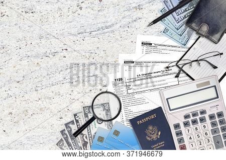 Irs Form 1120 U.s. Corporation Income Tax Return Lies On Flat Lay Office Table And Ready To Fill. U.
