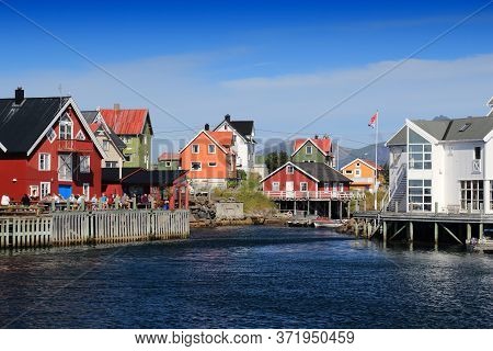 Henningsvaer, Norway - July 29, 2015: People Visit Henningsvaer Fishing Town In Lofoten Islands, Nor