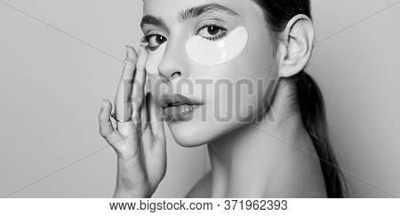 Beauty Girl Face With Flakes Under The Eyes. Womans Flakes. Patches Under Close Eyes For Woman. Youn