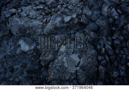 Dark Stone Texture With Shadows And Cracs