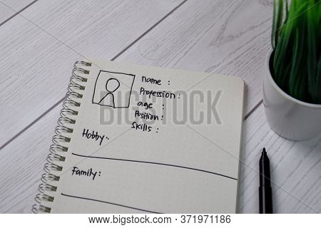 User's Persona Write On A Book Isolated On Wooden Table.