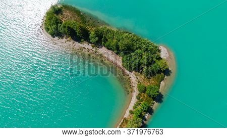 Aerial View Over Lake Forggensee At The City Of Fuessen In Bavaria Germany