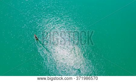 Aerial View Over Lake Forggensee At The City Of Fuessen In Bavaria Germany