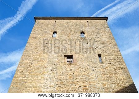 Medieval tower, known as the prison tower or clock tower, in the city of Jaca, Pyrenees, Huesca province, Aragon in Spain.
