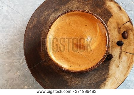 Dalgon Coffee In A Ceramic Cup On A Plate With Coffee Beans. Indian Origin, Whipped Instant Coffee W