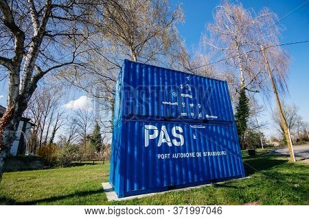 Strasbourg, France - Mar 18, 2020: Cargo Containers Painted In Blue Color And Pas Signage From Port 