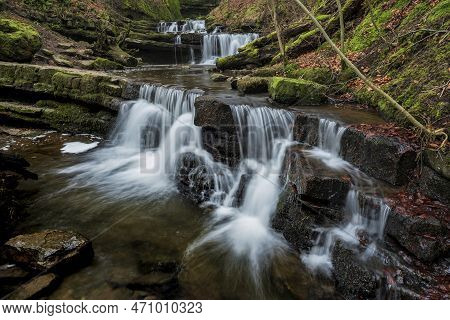 Beautiful Peaceful Landscape Image Of Aysgarth Falls In Yorkshire Dales In England During Winter Mor